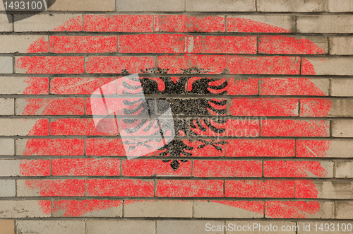 Image of flag of albania on grunge brick wall painted with chalk  