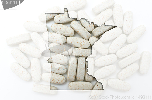 Image of Outline map of minnesota with transparent pills in the backgroun