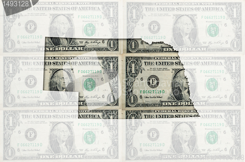 Image of Outline map of nebraska with transparent american dollar banknot