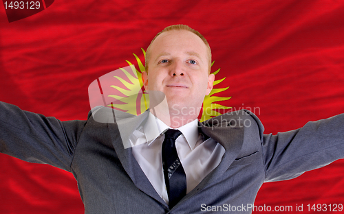 Image of happy businessman because of profitable investment in kyrghyzsta