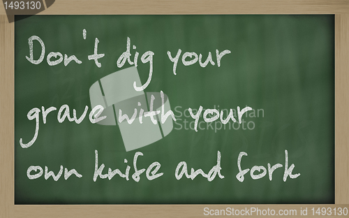 Image of " Don't dig your grave with your own knife and fork " written on