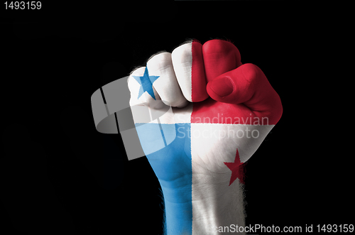 Image of Fist painted in colors of panama flag