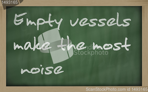Image of " Empty vessels make the most noise " written on a blackboard
