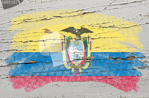Image of flag of ecuador on grunge wooden texture painted with chalk  