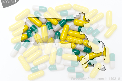 Image of Outline map of Massachusetts with transparent pills in the backg