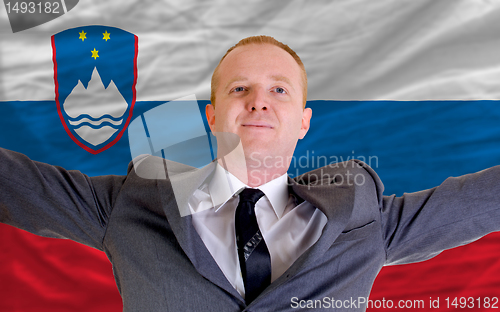 Image of happy businessman because of profitable investment in slovenia s