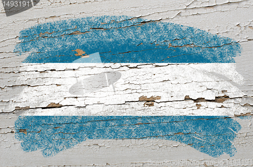 Image of flag of  el salvador on grunge wooden texture painted with chalk