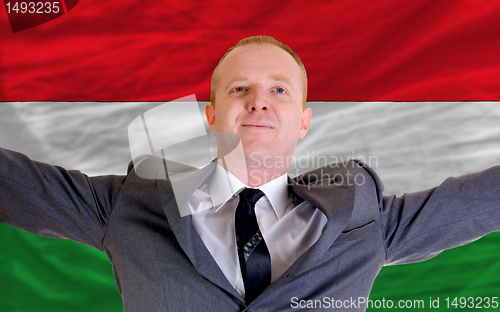 Image of happy businessman because of profitable investment in hungary st