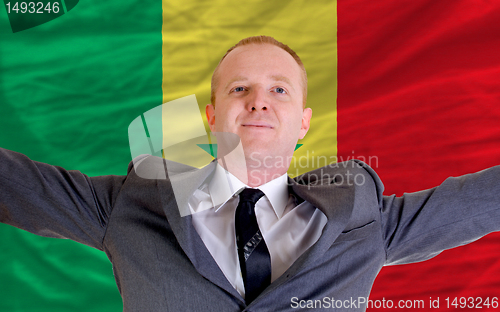 Image of happy businessman because of profitable investment in senegal st