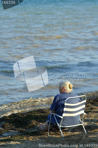 Image of Elderly lady on a seaside