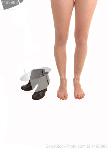 Image of Woman legs and boots.