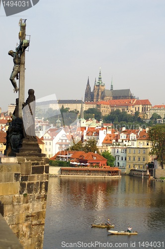 Image of Charles bridge and statues, jesus on the cross