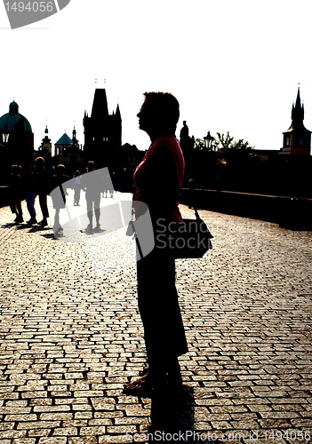 Image of silhouette on the Charles bridge and statues