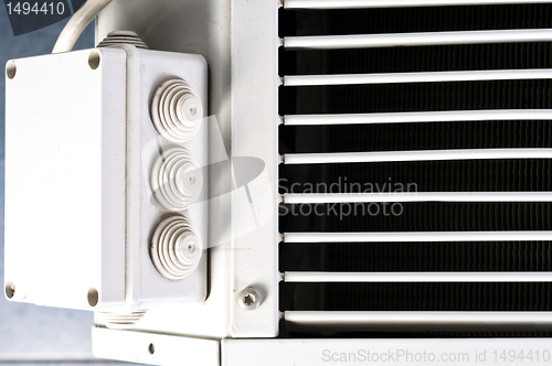 Image of An electrical box with an air conditioner