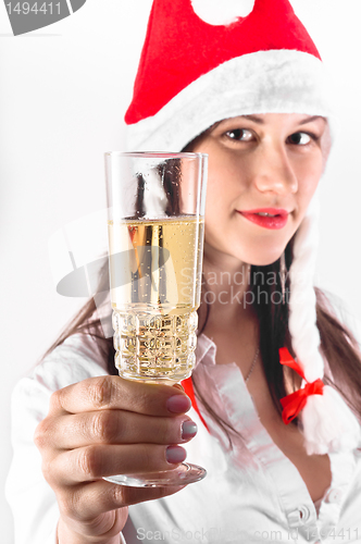 Image of Young woman in red hat waiting for the new year