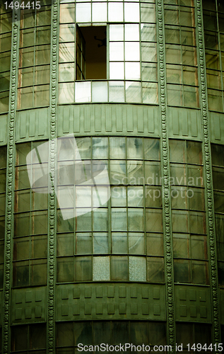 Image of Old commercial building with an opened window