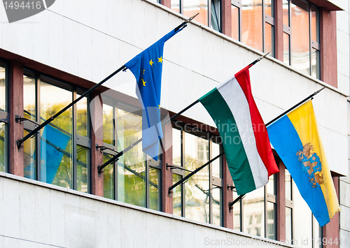 Image of Flags of some countries on an office building