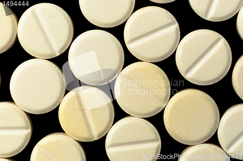 Image of Medical pills on black background