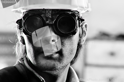 Image of Black and white photo of a man in helmet and goggles