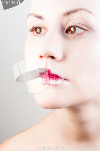 Image of Conceptual makeup on a young girl with white skin