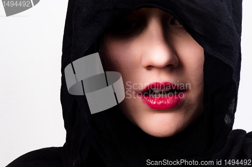 Image of Woman with black hood against white isolated background