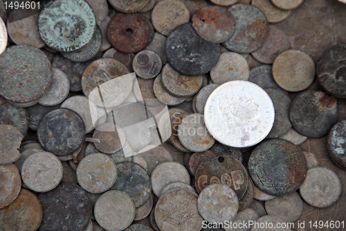 Image of Collection of old coins from different countries, El-Jem market, Tunisia