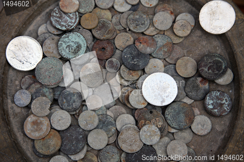 Image of Collection of old coins from different countries, El-Jem market, Tunisia