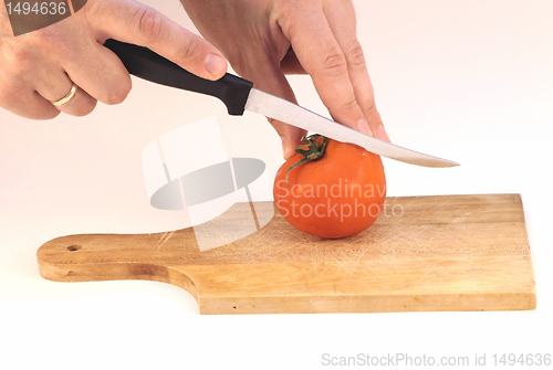 Image of Cutting a tomato