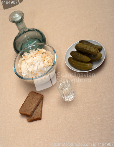 Image of Vodka and snack.