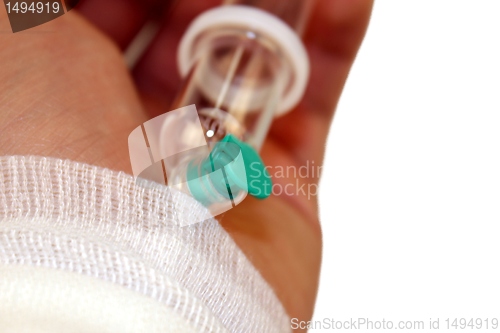 Image of hand with infusion needle