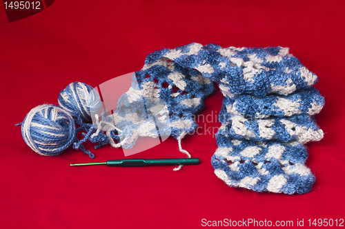 Image of Ball of yarn and knitting skewers