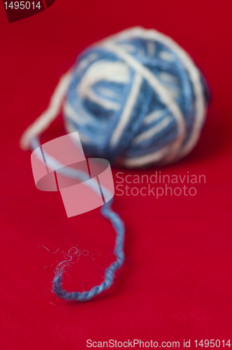 Image of Ball of yarn and knitting skewers