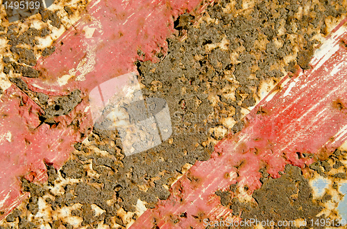 Image of Rusty painted metal plate background.
