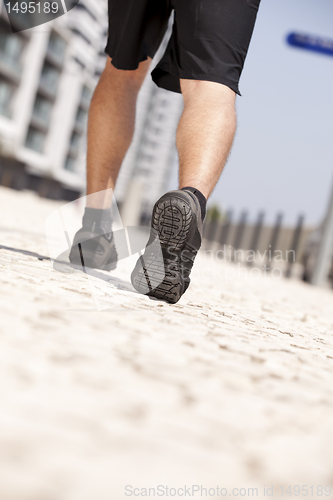 Image of Athlete man shoes walking