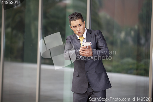 Image of Security Businessman with a handgun