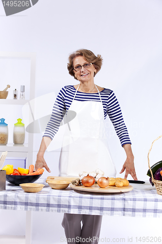 Image of Senior woman cooking