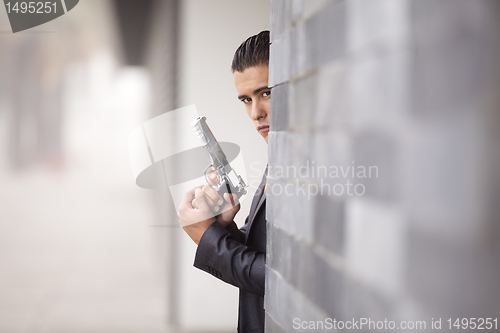 Image of Security Businessman with a handgun