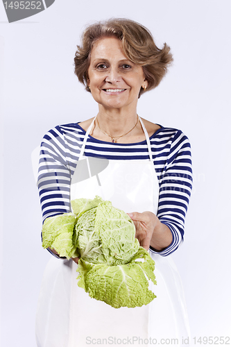 Image of Senior woman with a sprout
