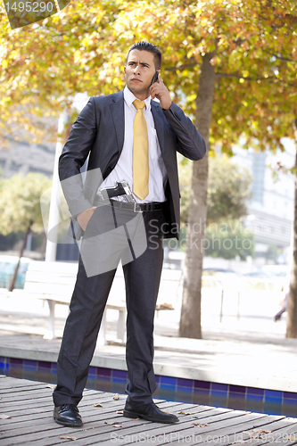 Image of Security Businessman with a handgun