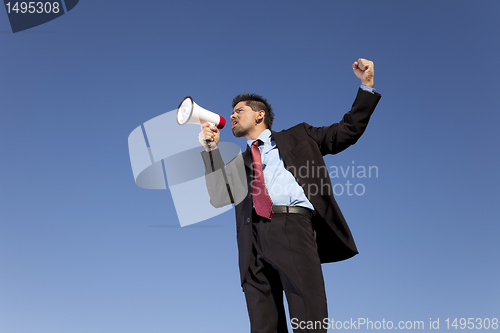 Image of Businessman speaking with a megaphone