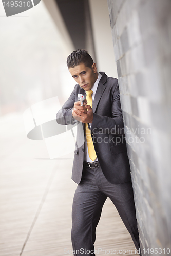 Image of Security Businessman with a handgun