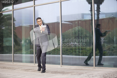 Image of Security Businessman with a handgun