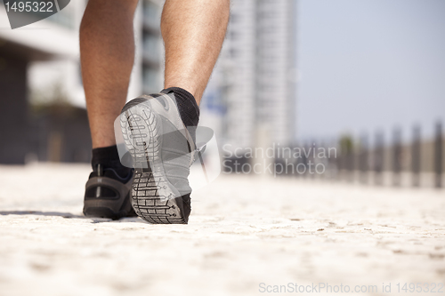 Image of Athlete man shoes walking