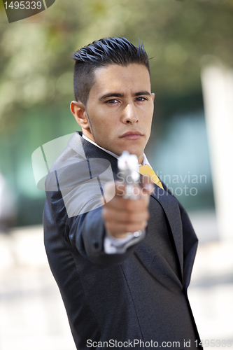 Image of Security Businessman with a handgun