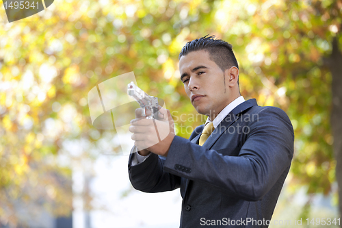 Image of Security Businessman with a handgun