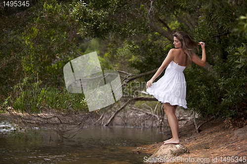 Image of Beauty young woman enjoying nature