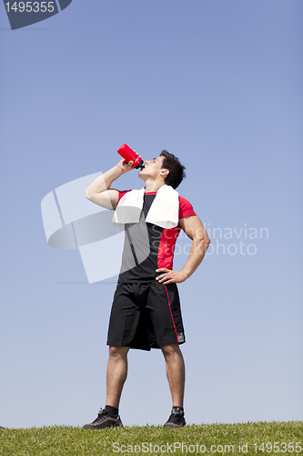 Image of man refreshing after the exercise