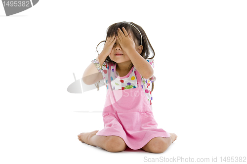 Image of little girl covering her eyes