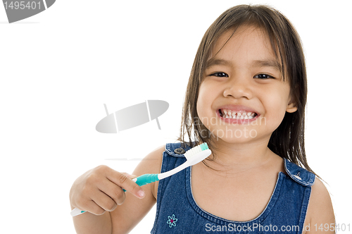 Image of little asian girl with toothbrush