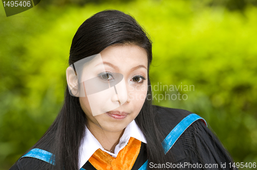 Image of pretty asian student on her graduation day